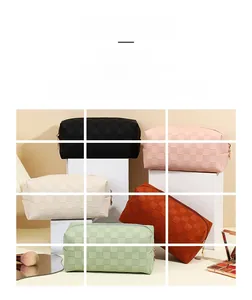 Close-up of checkerboard textured PU cosmetic bags in five colors with zipper closure