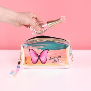 Laser butterfly cosmetic bag with iridescent gradient finish and handy wristlet strap