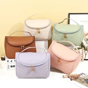 Portable PU leather makeup bags with woven texture and gold leaf pendants in five colors