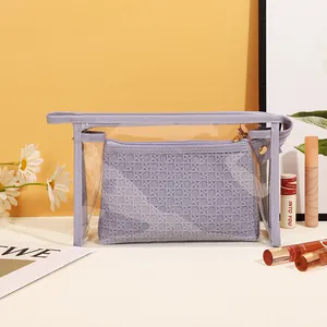 Portable purple travel toiletry bag set with transparent PVC outer and woven inner pouch