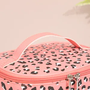 Pink leopard print PU leather makeup bag with silver zippers and top handle