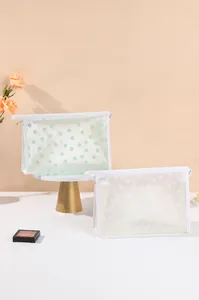 Detailed view of two-piece semi-transparent mesh makeup bags with floral patterns