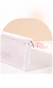 Detail of floral mesh makeup bag featuring smooth silver metal zipper and soft fabric trim
