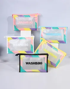 Detail of five multi-colored waterproof PVC toiletry bags with frosted window and zipper