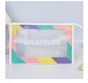 Detail of waterproof WASHBAG with colorful stripes, top zipper, and frosted PVC window