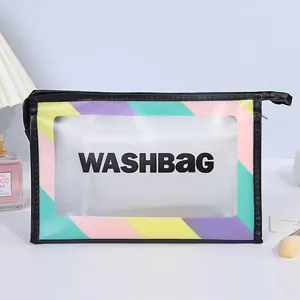 Translucent frosted PVC washbag with rainbow trim and black washbag text branding