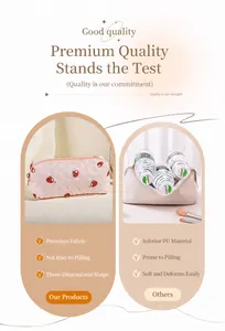 Detail of pink strawberry quilted makeup bag showing sturdy shape versus thin material