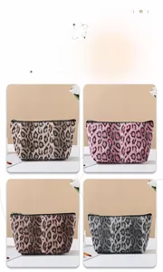 Detail view of four leopard print makeup bags in brown, pink, dark coffee, and grey colors