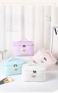 Quilted bubble texture cosmetic bags with bear charms in pastel assorted colors