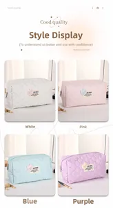 Detail view of heart-quilted makeup bags with bear patches in four pastel colors