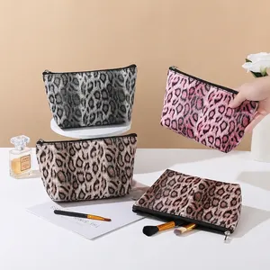 Fashionable leopard print cosmetic bags in four colors with large storage capacity