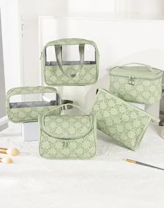 Detail view of mint green PU leather toiletry bags with elegant floral patterns