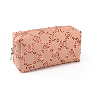 Nude PU leather square makeup bag featuring elegant red floral print and top zipper