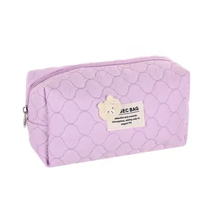 Quilted lavender cosmetic bag with cute bear patch and zipper closure for travel