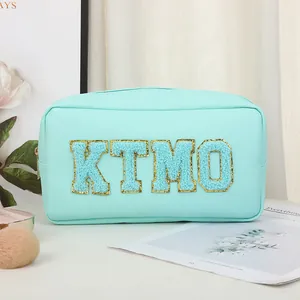 Mint green PU leather makeup bag with chenille KTMO letters and gold zipper