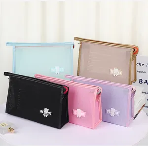 Mesh makeup bags in various colors featuring bear patches and secure zipper closure