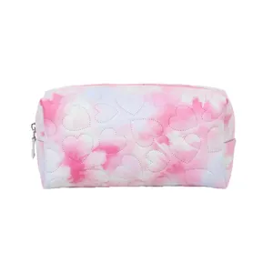 Pink and white heart-quilted makeup bag with top zipper and tie-dye pattern