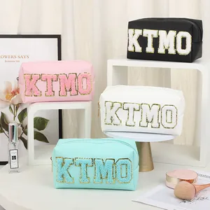 Grande borsa cosmetica impermeabile in pelle PU con scritte KTMO in quattro colori