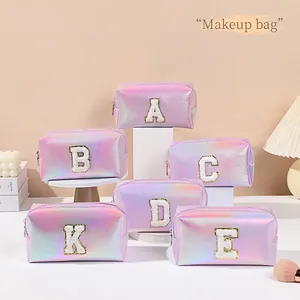 Holographic PU leather makeup bags with chenille letter patches in soft purple and pink