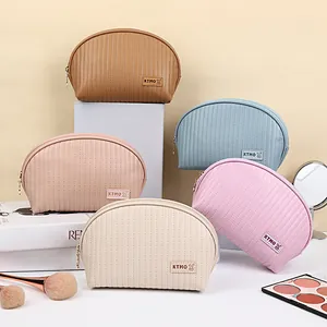 Waterproof PU leather shell makeup bags in five colors with quilted vertical stitching