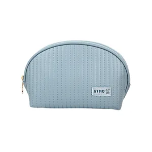 Light blue PU leather shell makeup bag with vertical quilting and rabbit logo detail