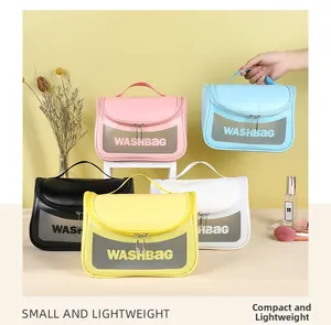Detail view of colorful waterproof toiletry bags with clear window and handle