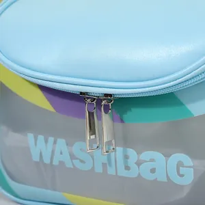 Blue leather and transparent PVC wash bag with silver dual zippers and logo detail