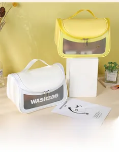 Close-up of waterproof TPU wash bag with top handle and WASHBAG print detail