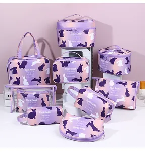 Detailed collection of purple gradient Black Rabbit cosmetic bags in various shapes and sizes