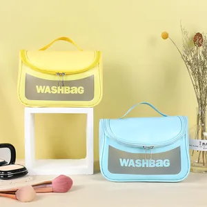 Portable waterproof wash bag with clear window and top handle in yellow and blue colors