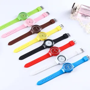 Collection of eight colorful silicone quartz watches for women in various bright candy shades