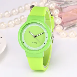 Vibrant lime green silicone quartz watch with minimalist dial and silver hands