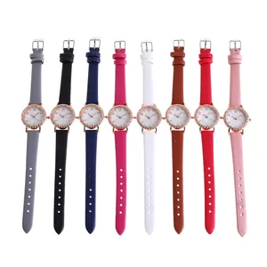 Elegant women's quartz watch with rhinestone bezel and shell dial in eight colors