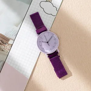 Close-up of a stylish purple quartz watch with a milanese mesh band on a textured background