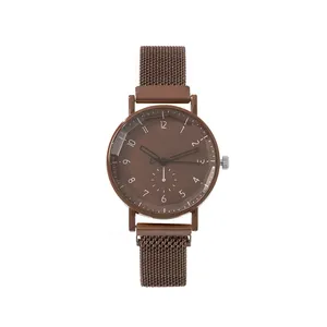 Minimalist dark brown quartz watch with mesh metal strap and small seconds dial
