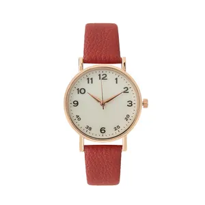 Women's vintage quartz watch with rose gold case, red leather strap and white dial