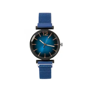 Minimalist women's watch with blue gradient dial and rose gold markers on mesh band