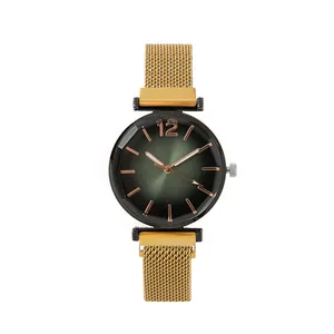 Detail of green sunray dial quartz watch with rose gold indices and mesh steel strap