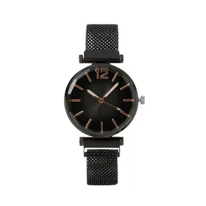 Minimalist black mesh watch for women with faceted glass and rose gold dial details