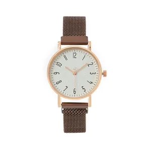Elegant rose gold watch with brown mesh strap and sunray textured white dial
