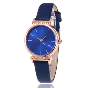 Reloj de cuarzo rosa para mujer con correa de cuero azul marino y detalles strass