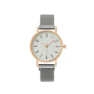 Elegant rose gold watch with white textured dial and grey magnetic mesh strap