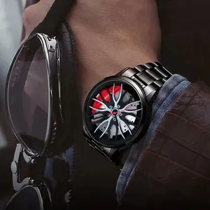 Detail of racing wheel hub watch dial with red brake caliper and black steel strap