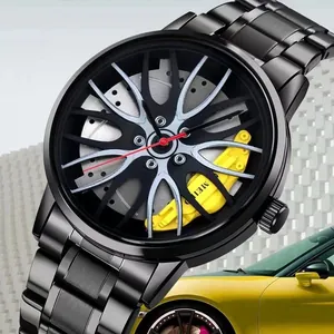 Macro shot of 3D racing wheel rim dial with yellow brake caliper on black steel watch