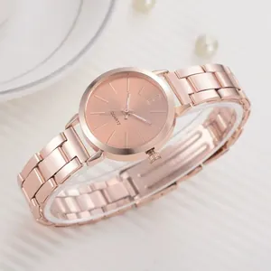 Elegant rose gold women's quartz watch with slim steel strap and minimalist dial