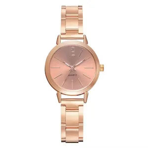 Elegant rose gold women's quartz watch with a slim metal strap on a white background