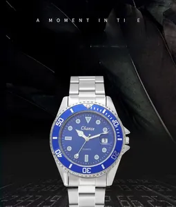 Macro detail of men's silver stainless steel watch with blue dial and rotating bezel