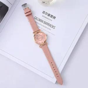 Pink quartz watch with rose gold case and heart-shaped rhinestones on the dial