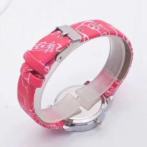 Detail showing pink musical note strap and stainless steel back of children's watch