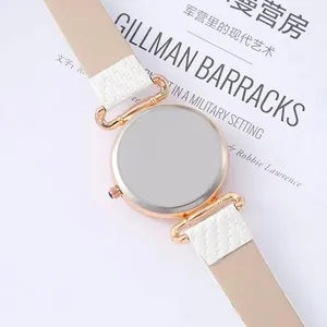 Minimalist women's quartz watch with beige leather strap and rose gold metal case back